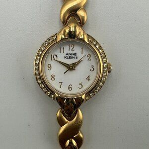 Anne Klein Watch Women Gold Tone White Dial Crystal Bezel Dainty New Battery 7"